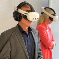 a man and a woman were virtual-reality mask and headphones