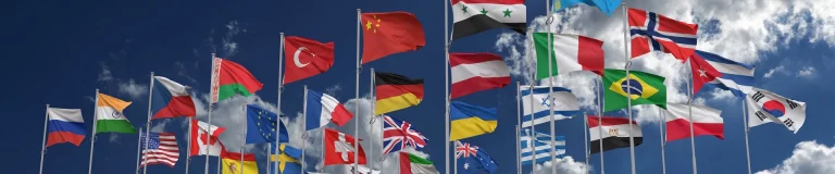 international flags blowing in the wind