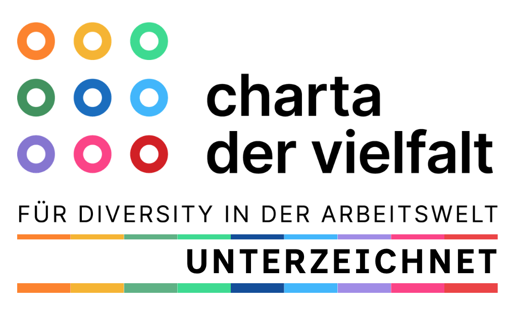 Logo der Charta der Vielfalt mit bunten Kreisen und dem Schriftzug „Für Diversity in der Arbeitswelt“.